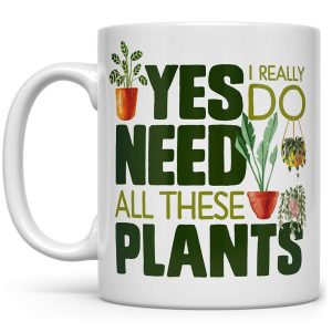 Garden-themed mug for plant lovers says “I need all these plants”.